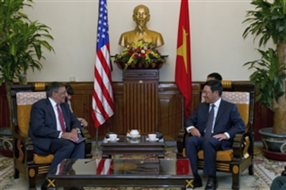 U.S. Defense Secretary Leon E. Panetta speaks with Pham Binh Minh, Vietnamese foreign affairs minister, during a meeting in Hanoi, Vietnam,  June 4, 2012.  