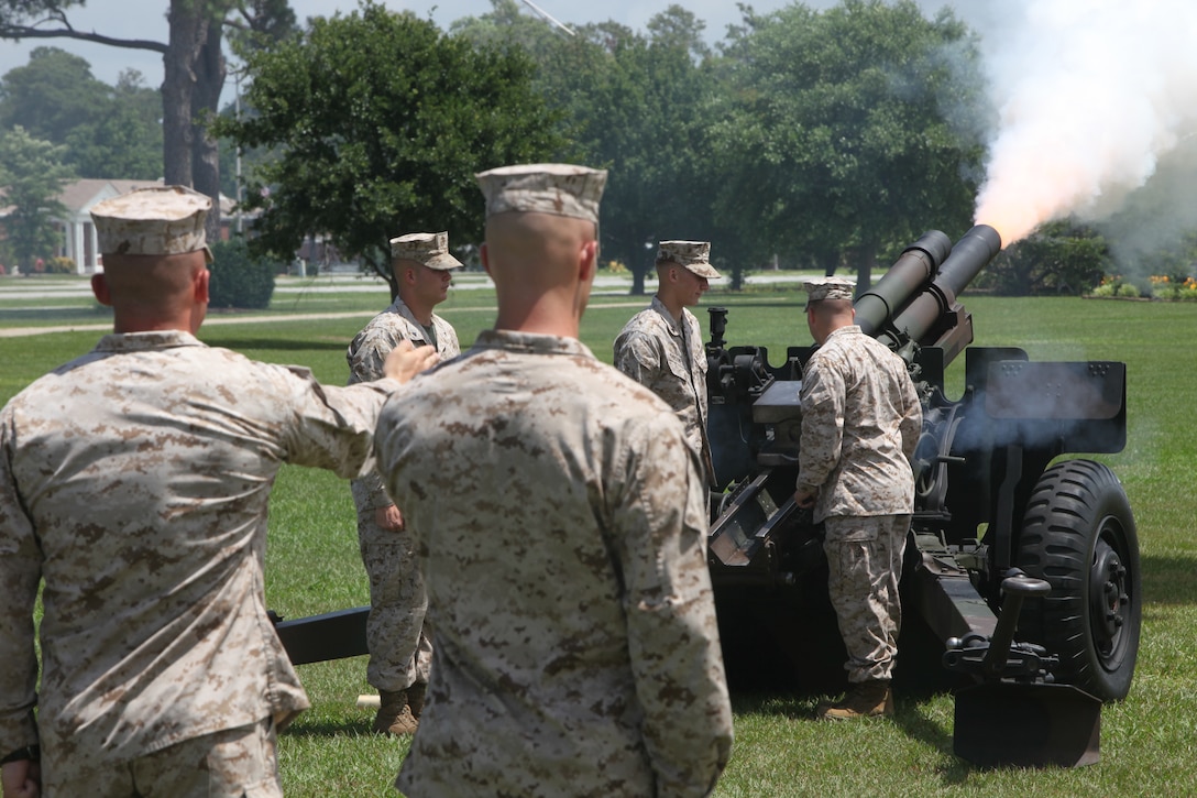 2nd Lt. Stephen Mulcahy, the Battery K, second platoon commander, gives the order for Marines to fire another round during the Memorial Day 2012 21-gun salute ceremony aboard Marine Corps Base Camp Lejeune May 28.