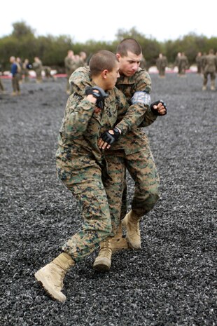 Company I recruits demonstrate counter to the rear choke May 23 aboard Marine Corps Recruit Depot San Diego. Co. I completed their Marine Corps Martial Arts Program tan belt test that consisted of various fundamentals of MCMAP. This is one of the many requirements recruits must accomplish to earn the title Marine.