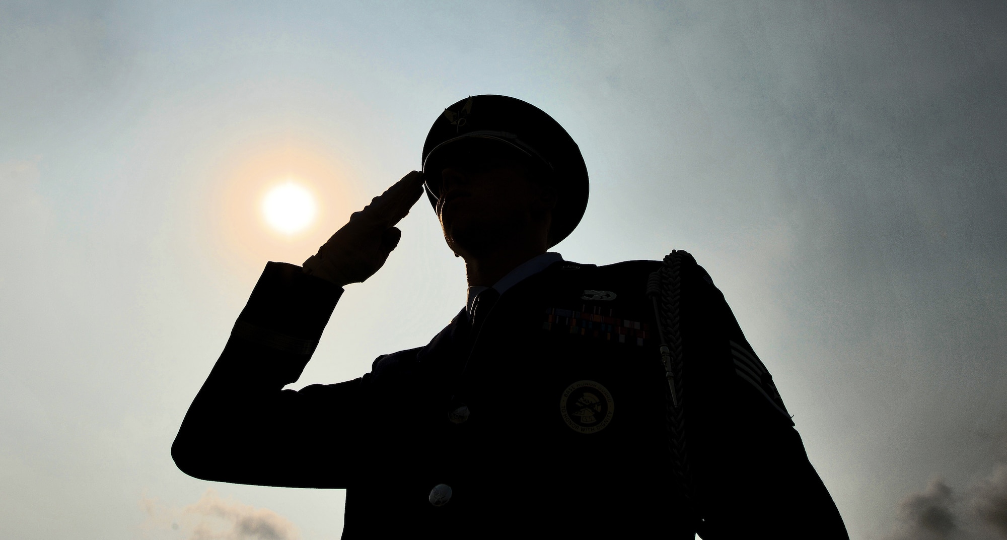 WHITEMAN AIR FORCE BASE, Mo. -- A ceremonial guardsman from the 509th Bomb Wing Honor Guard salutes during the playing of the Star Spangled Banner at a Wing Retreat Ceremony in honor of Memorial Day May 24, 2012. Memorial Day was officially proclaimed in 1868 and became widespread by 1902. It was named a federal holiday in 1971. (U.S. Air Force photo/Senior Airman Nick Wilson) (Released) 