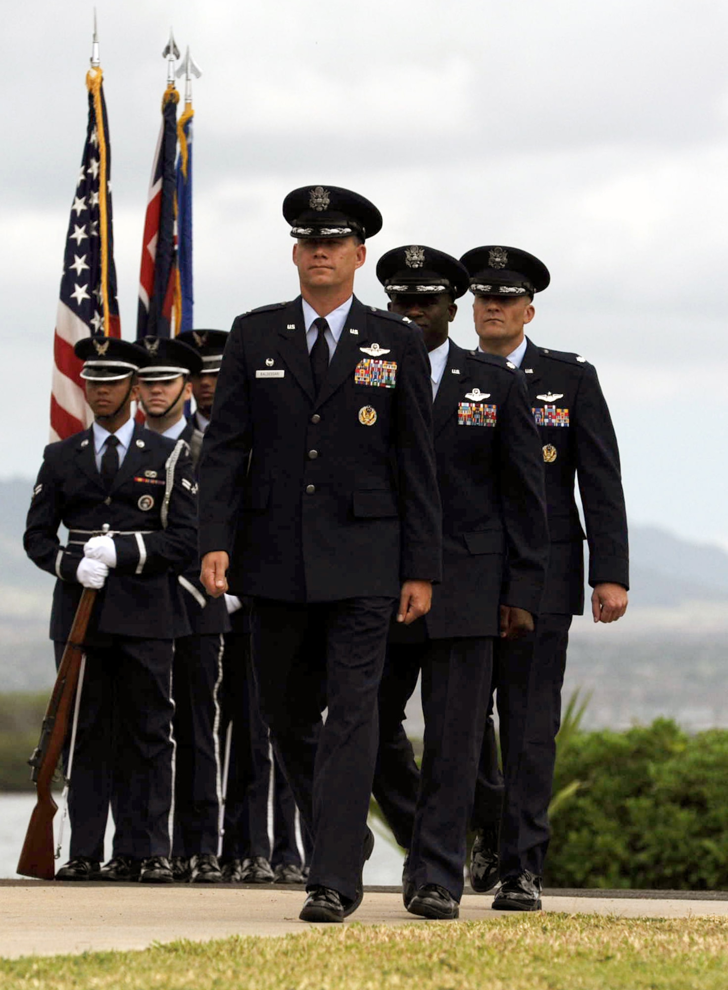 Col. David Baldessari, 15th Operations Group commander, marches with Lt. Col. Brian Hill, outgoing 96th Air Refueling Squadron commander, and Lt. Col. Brian Deutsch, incoming 96 ARS commander, during the 96 ARS Change of Command ceremony June 5 at Joint Base Pearl Harbor-Hickam, Hawaii. The unit has been involved in campaigns around the world including World War II, Pacific Anti-submarine, American Theater, Air Offensive over Japan, Eastern Mandates, Western Pacific, Ryukyus and the China Offensive. (U.S. Air Force photo by Staff Sgt.
Nathan Allen)
