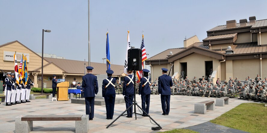 Members of the Wolf Pack came together to pay homage to American service members who paid the ultimate sacrifice during the 2012 Memorial Day remembrance ceremony at Kunsan Air Base, Republic of Korea, May 25, 2012. Memorial Day honors all American service members for their sacrifices and dedication. (U.S. Air Force photo/Staff Sgt. Rasheen A. Douglas)