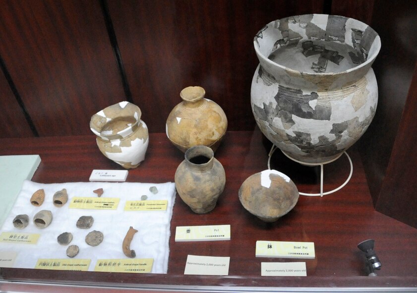Several pots, jars and other artifacts found in and around Misawa Air Base, Japan, are kept on display at the Torii building June 5, 2012. The annual display includes items estimated to be between 2,000 and 8,600 years old from the pre-historic Jomon to Yayoi periods. (U.S. Air Force photo by Airman 1st Class Kaleb Snay/Released)
