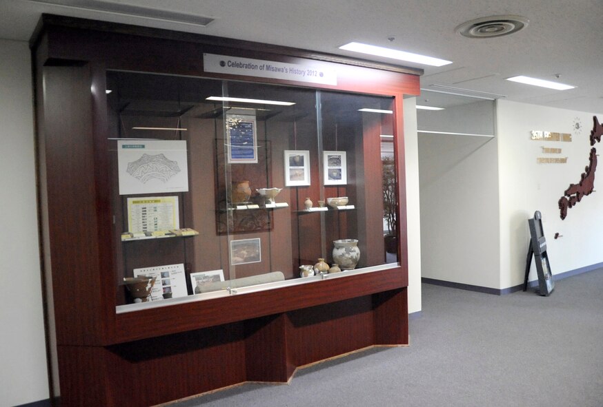 Ancient Japanese artifacts found in the Misawa area are displayed in the main lobby of the Torii building at Misawa Air Base, Japan, June 5, 2012. The display was made to promote the rich history of archeological and cultural resources at Misawa Air Base. (U.S. Air Force photo by Airman 1st Class Kaleb Snay/Released)