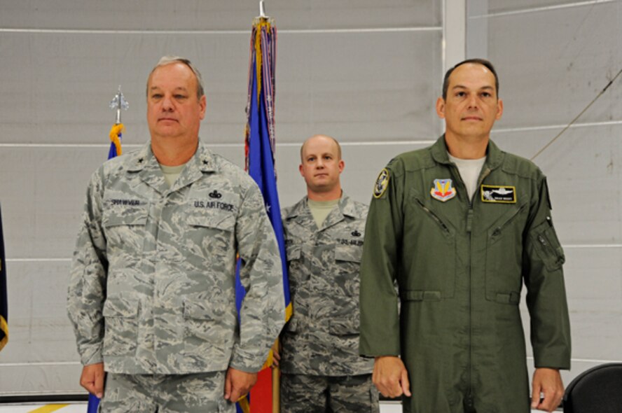 Col. William B. "Brad" Richy (right) with Idaho Air National Guard Commander Brig. Gen. William Shawver stand in front of 124th Fighter Wing members to signify Richy as the new commander June 3 at Gowen Field in Boise, Idaho. Richy, a command pilot, has flown 15 types of civilian and military aircraft throughout his career, including the A-10 Thunderbolt II and the B-747.  (U.S. Air Force photo by Tech. Sgt. Becky Vanshur)— at Gowen Field.