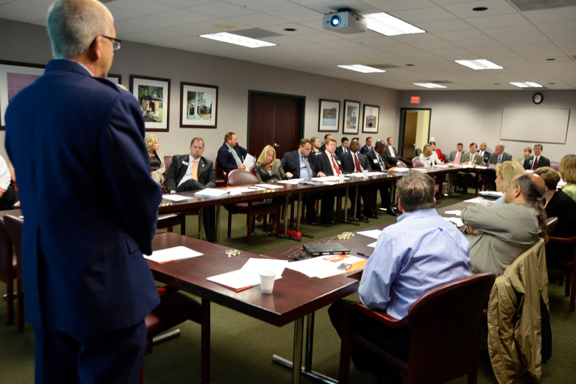 Col. Tim Tarchick, 94th Airlift Wing commander, addresses members of the Cobb Chamber at their Board of Directors meeting in Marietta, Ga., June 4. Topics discussed were the 94th AW mission, and a vital issue that impacts Reservists’ ability to accomplish the mission, employment. (U.S. Air Force photo/Master Sgt. James Branch)