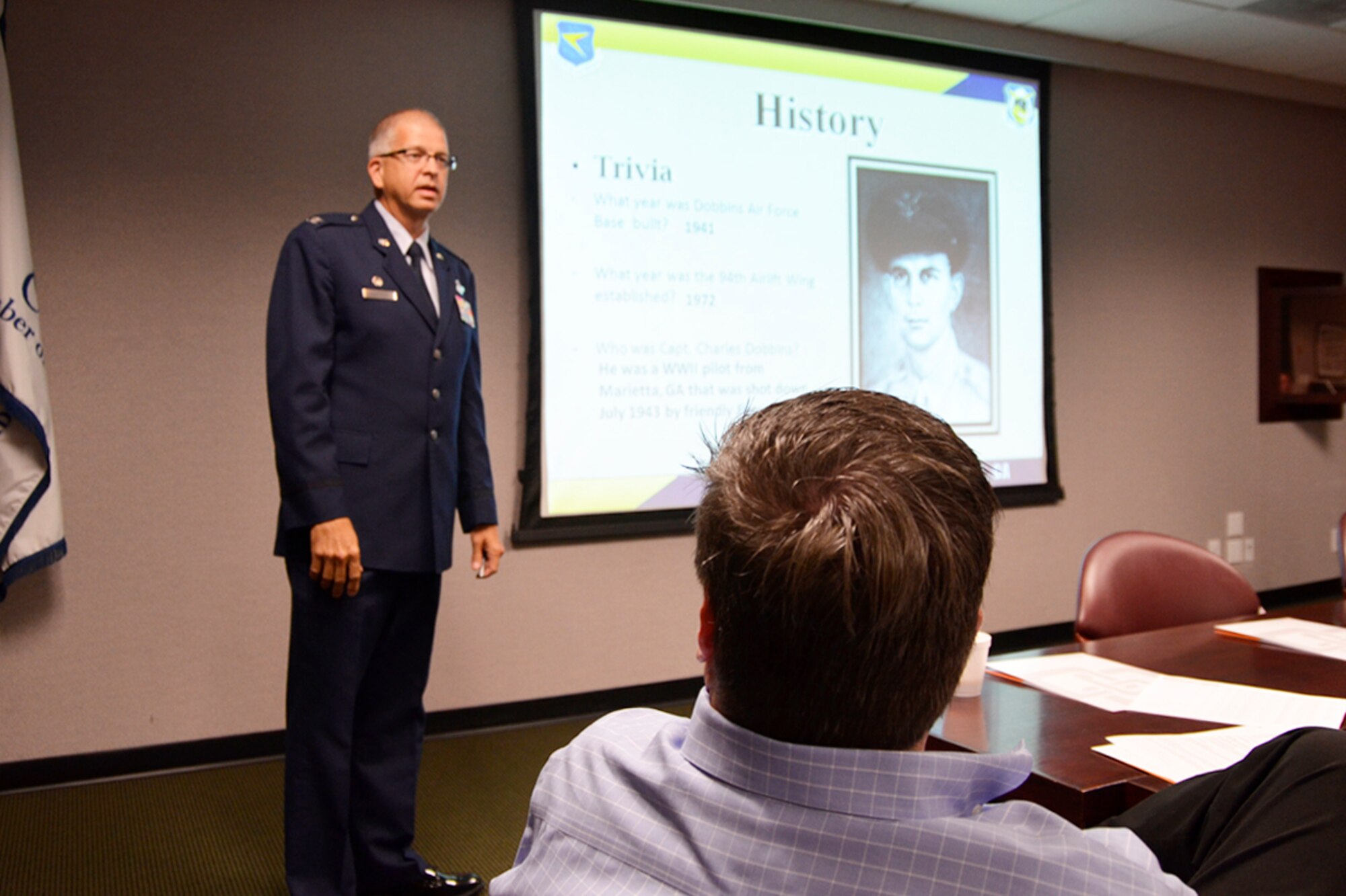 Col. Tim Tarchick, 94th Airlift Wing commander, gives members of the Cobb Chamber a brief history of Dobbins Air Reserve Base of at their Board of Directors meeting in Marietta, Ga., June 4. (U.S. Air Force photo/Master Sgt. James Branch)