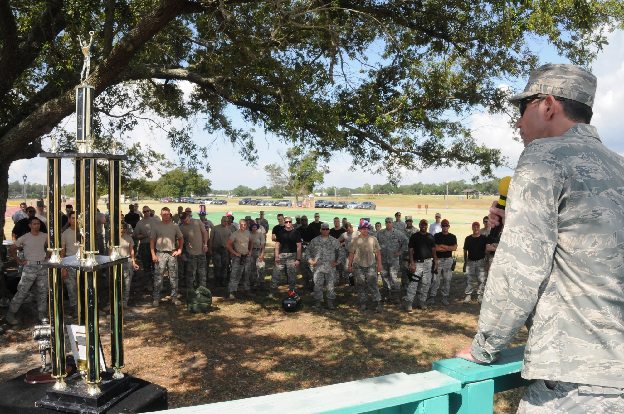 Col. Rodney Berk, 81st Mission Support Group commander gives closing remarks prior to announcing the top three teams in the 81st MSG Ultimate Warrior Challenge June 1, 2012, at the Triangle Track at Keesler Air Force Base, Miss.  The challenge was held in honor of fellow service members who lost their lives in the fight for our nation’s freedom. It consisted of nine four-member teams racing in a competition designed to take them through various aspects of a deployment.  (U.S. Air Force photo by Kemberly Groue)