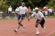 Military Day was celebrated at the 2012 D.C. Special Olympics, May 23, at Catholic University. Air Force District of Washington Commander Maj. Gen. Darren W. McDew participated in a 4x100 meter relay race with athletes to kick-off the day's events. U.S. Navy Ceremonial Guard presented the colors, U.S. Air Force Honor Guard Drill Team performed and countless military members volunteered to help with the events. (U.S. Air Force photos by Senior Airman Steele C. G. Britton)