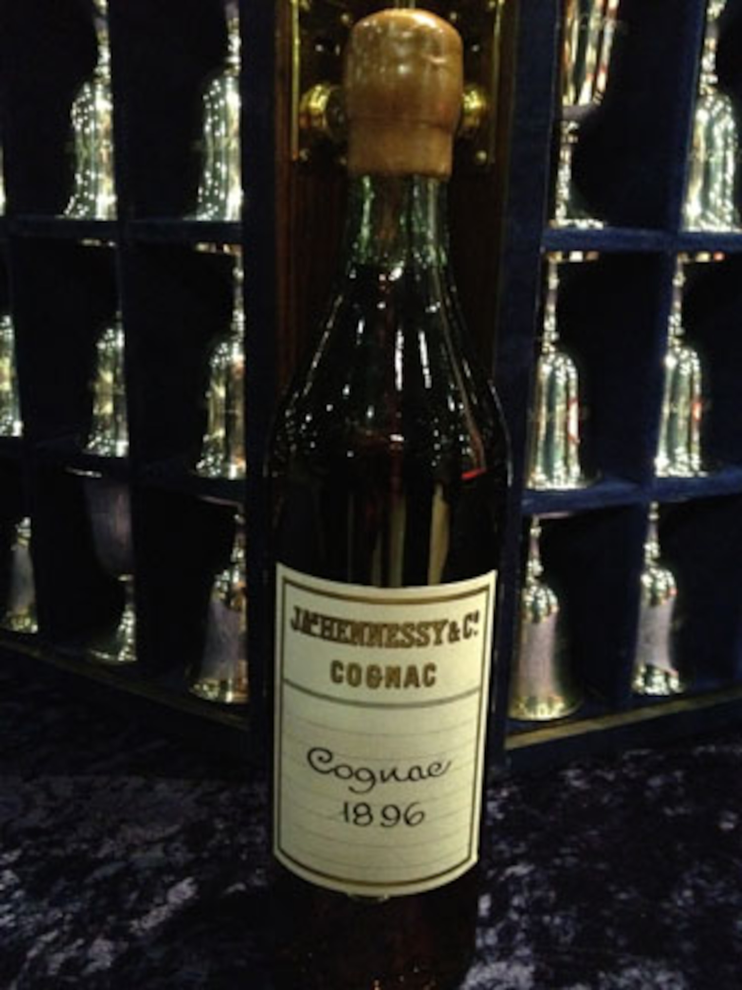Replica of the bottle of the 1896 Hennessy Very Special cognac presented by
the Hennessy Company to General Doolittle, who was born in 1896.  This
replica is currently on display with the Doolittle Raiders' goblets at the
National Museum of the United States Air Force. (U.S. Air Force photo).
