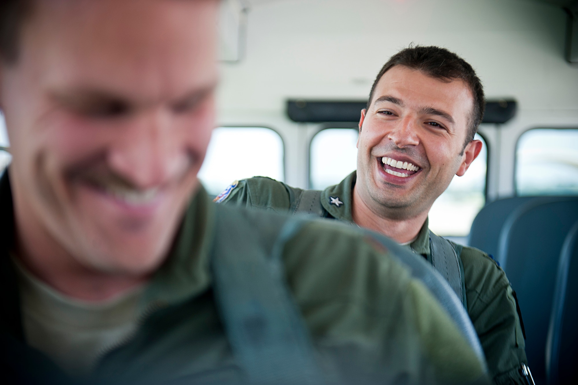 Italian air force Capitano (Capt.) Maurizio De Guida, 74th Fighter Squadron exchange pilot, shares a laugh with U.S. Air Force Maj. Ben Rudolphi, 23d Fighter Group chief of weapon tactics, while making their way to the flightline May 31, 2012, at Moody Air Force Base, Ga. De Guida is serving a three-year tour at Moody which started in September of 2009. The exchange program allows U.S. and Italian pilots to share knowledge and become familiar with each other, preparing them for possibly joint-deployment operations. (U.S. Air Force photo by Staff Sgt. Jamal D. Sutter/Released)