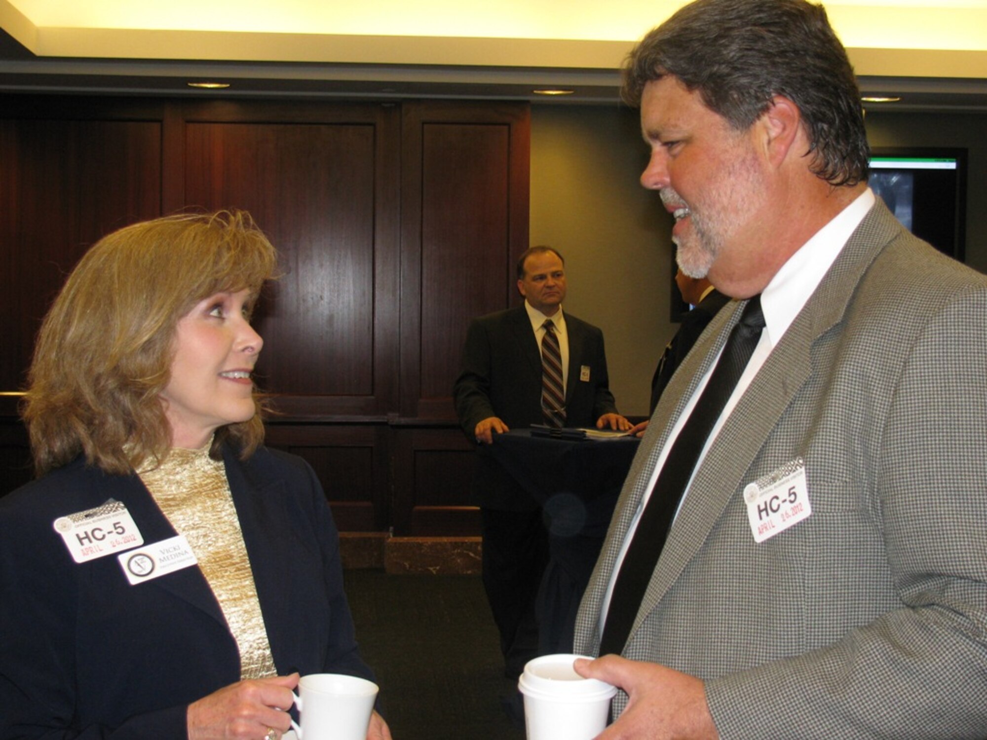 Mike Niederhauser, ACC community relations and public service chair, introduces __ District Congressman Diane Black (left) to Cathy Hart, director-at-large of the Antelope Valley Board of Trade (right).