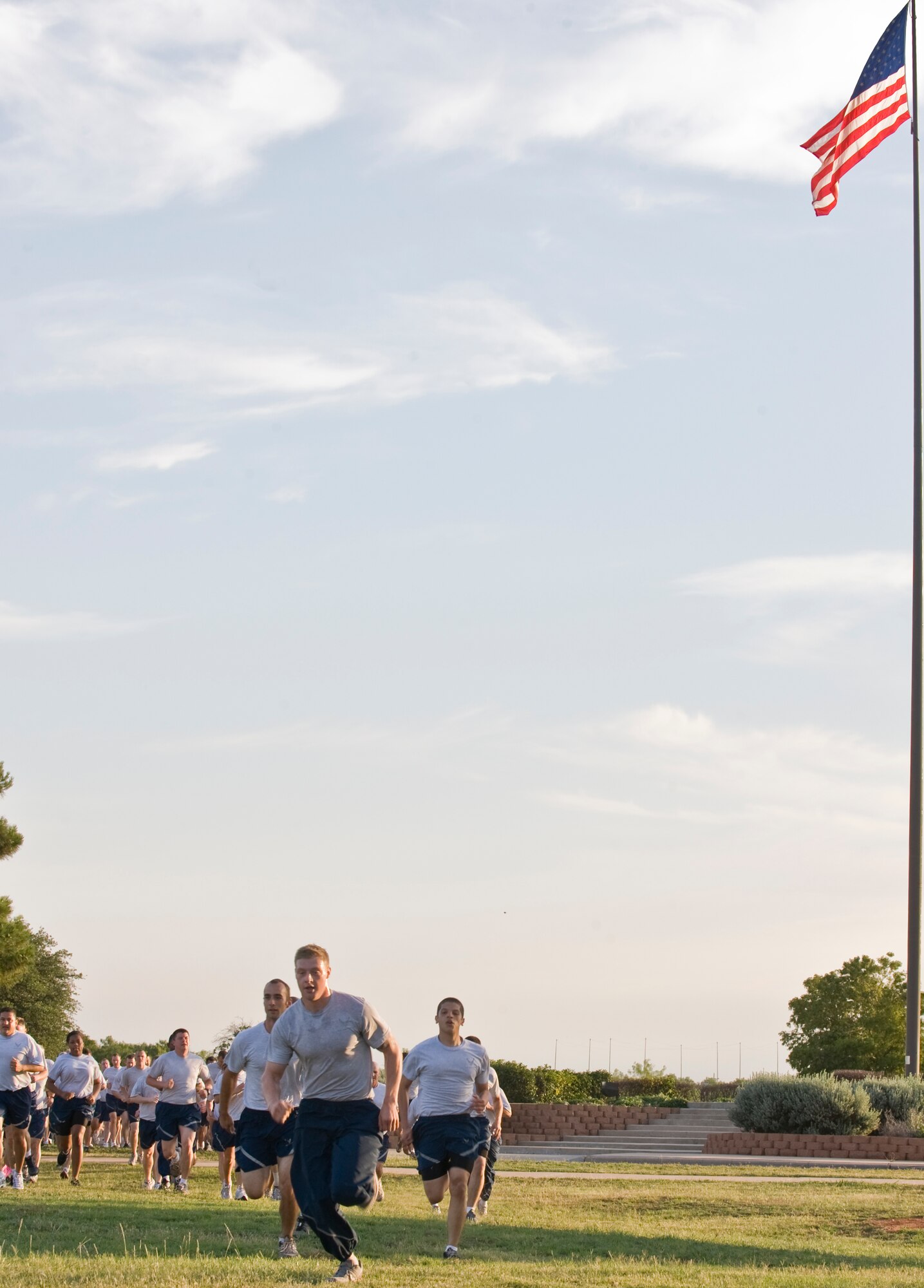 Airmen from the 317th Airlift Group participate in a fun-run June 1, 2012, at Dyess Air Force Base, Texas. The airlift group encouraged the importance of fitness safety during the 101 Critical Days of Summer (U.S. Air Force photo by Airman 1st Class Jonathan Stefanko/ Released)