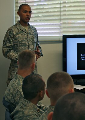 Tech. Sgt. Jewell, 13th Intelligence Squadron, speaks to Sacramento State Air Force ROTC cadets about the Air Force Code of Conduct May 2, 2012 at the university campus in Sacramento, Calif. The goal of the visit to the campus was to bring personnel outside of the Air Force ROTC cadre to help expand cadet?s knowledge. (U.S. Air Force courtesy photo. This image has been altered for operational security)