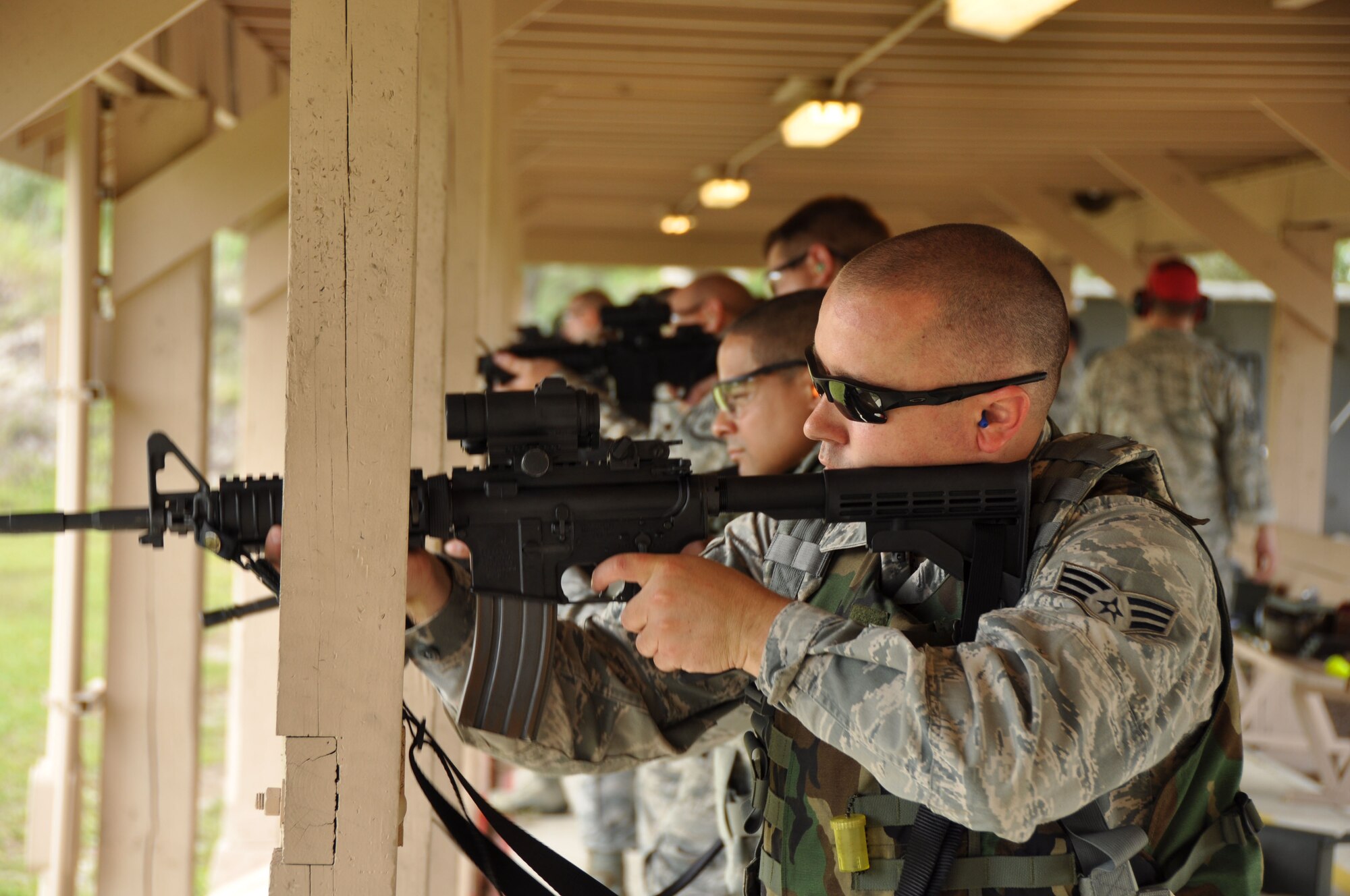 MACDILL AIR FORCE BASE, Fla. -- Senior Airman Robert Dougherty, an aerospace ground equipment technician with the 927th Maintenance Squadron, was one of the first reservists to participate in the new Air Force Rifle/Carbine Qualification Course.  The new course focuses on survival in urban combat, focusing on skills in target recognition, use of cover, and firing while moving.  (Official U.S. Air Force photo/Staff Sgt. Shawn Rhodes)