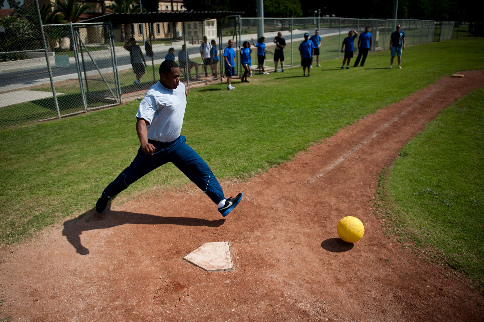 The 39th Security Forces Squadron and 39th Contracting Squadron teams play kickball during the 39th Air Base Wing Sports Day June 1, 2012, at Incirlik Air Base, Turkey. The 39th SFS team won the game 11-10. (U.S. Air Force photo by Tech. Sgt. Michael B. Keller/Released)