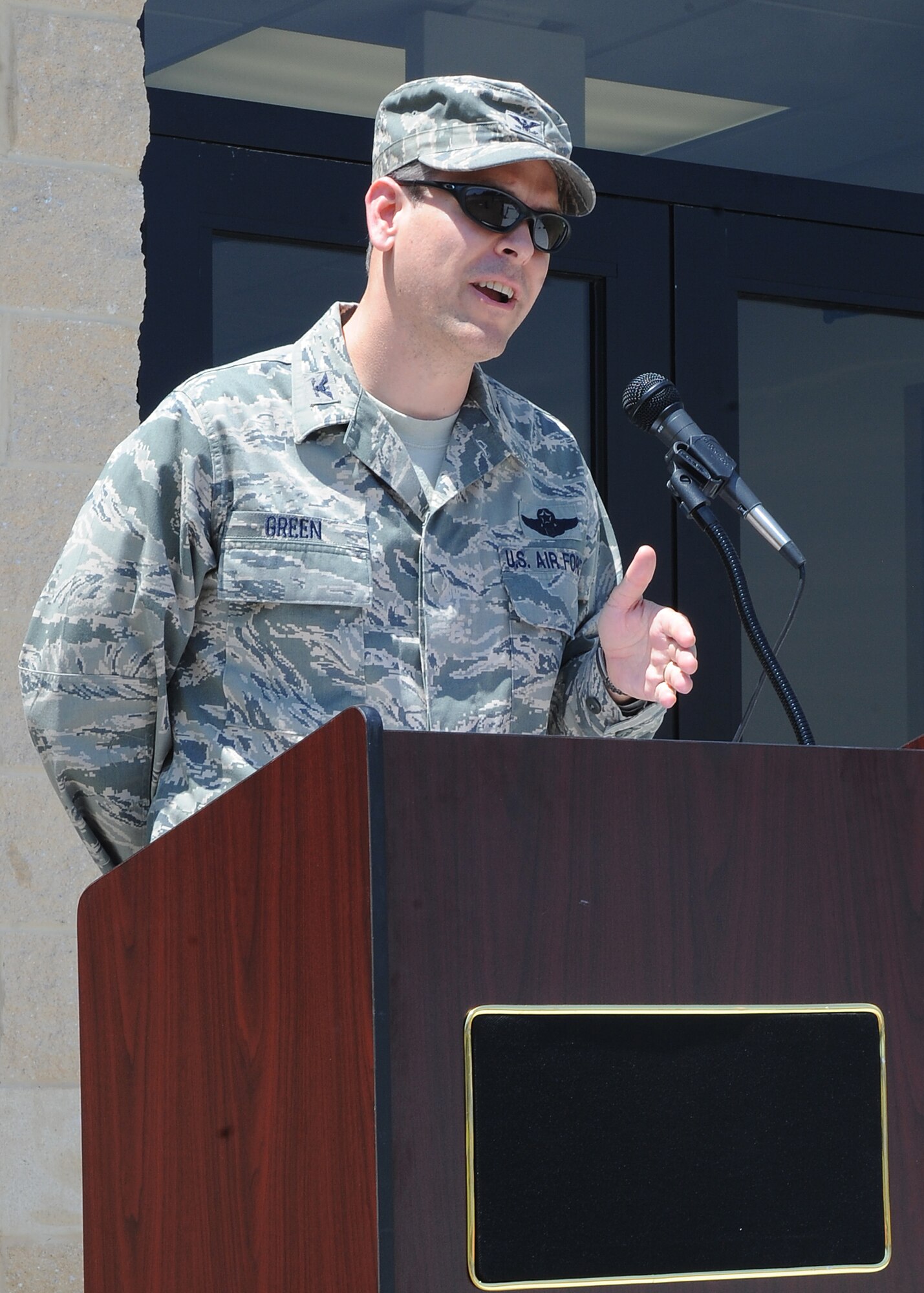 U.S. Air Force Col. Vann Green addresses a crowd gathered to witness the opening of the fitness assessment cell on Seymour Johnson Air Force Base, N.C., May 31, 2012. The FAC provides Airmen a place to undergo their physical fitness testing. Green, 4th Fighter Wing vice commander, is from Jackson, Miss. (U.S. Air Force photo/Airman 1st Class John Nieves Camacho/Released)