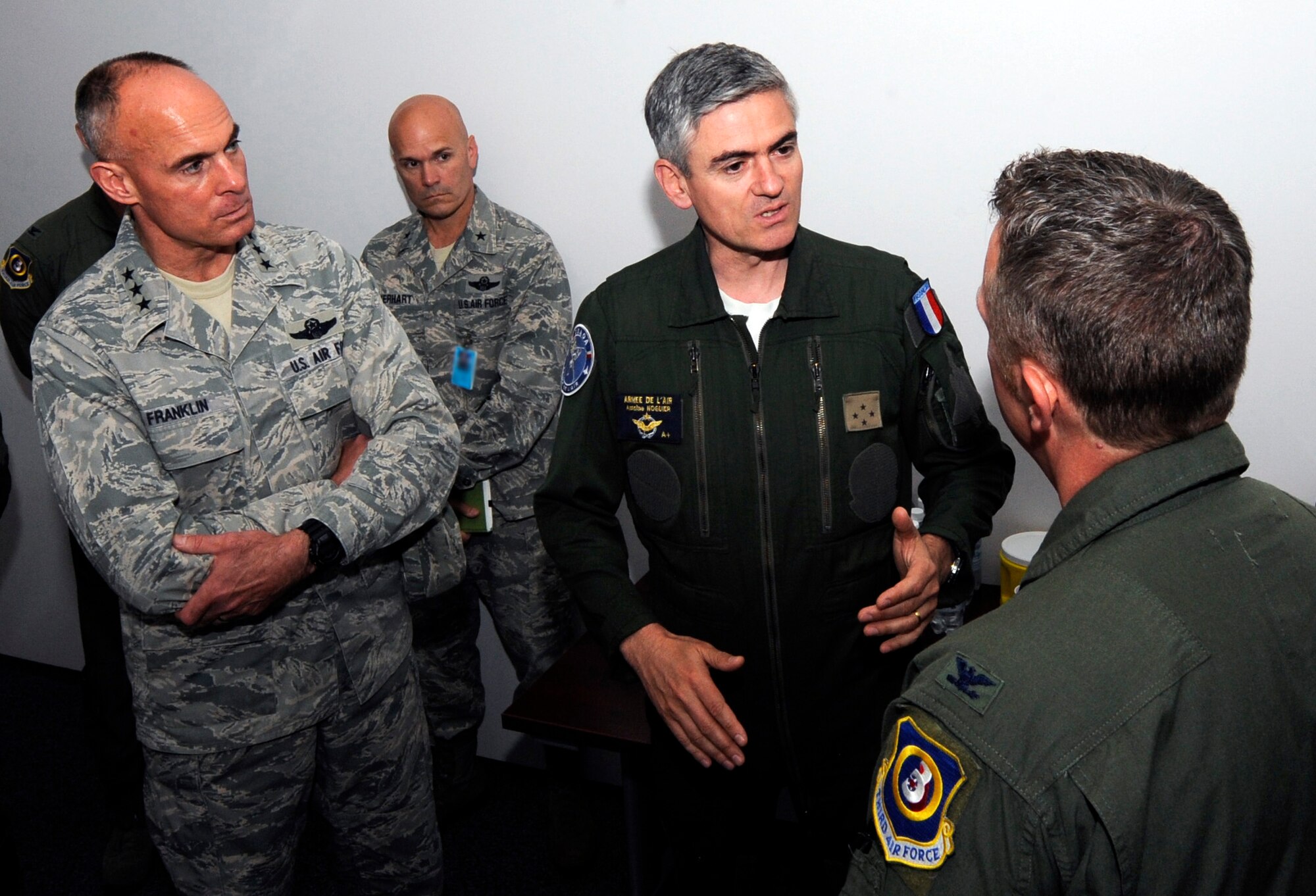 Col. Peter Davey, 603rd Air and Space Operations Center commander, briefs
Lt. Gen. Craig Franklin, 3rd Air Force commander, and Lt. Gen. Antoine
Noguier, French Air Force Air Defense and Air Operations commander, during a
NATO tour of the 603rd AOC on Ramstein Air Base, June 1, 2012.  Noguier's
visit was to develop relations with the new 3rd AF commander and see
how the 603rd AOC accomplishes their air and space mission in the European
and African Command by utilizing U.S. forces, Department of Defense
civilians, and coalition forces. (U.S. Air Force photo/ Senior Airman
Aaron-Forrest Wainwright)
