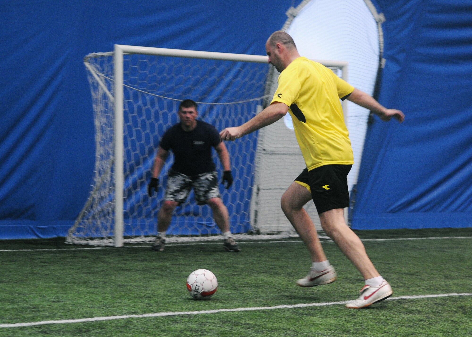 CAPLJINA, Bosnia and Herzegovina -- U.S. military members, including members of the 48th Fighter Wing, participating in Shared Resilience 2012 and the Municipal of Capljina soccer team play soccer at the Sports Center Capljina June 1, 2012. The local team won the match 20-2. More than 500 military members from nine nations are participating in SR12, the annual U.S. Joint Chiefs of Staff sponsored medical exercise, May 28 - June 8. The goals of the exercise are to strengthen interoperability, facilitate training in crisis response and disaster management, and validate the readiness of deployable military medical and humanitarian assistance teams. The exercise, in the spirit of partnership for peace, directly supports U.S. European Command's theater cooperation efforts and strategy for active security with European countries. (U.S. Air Force photo by Staff Sgt. Tabitha Lee)