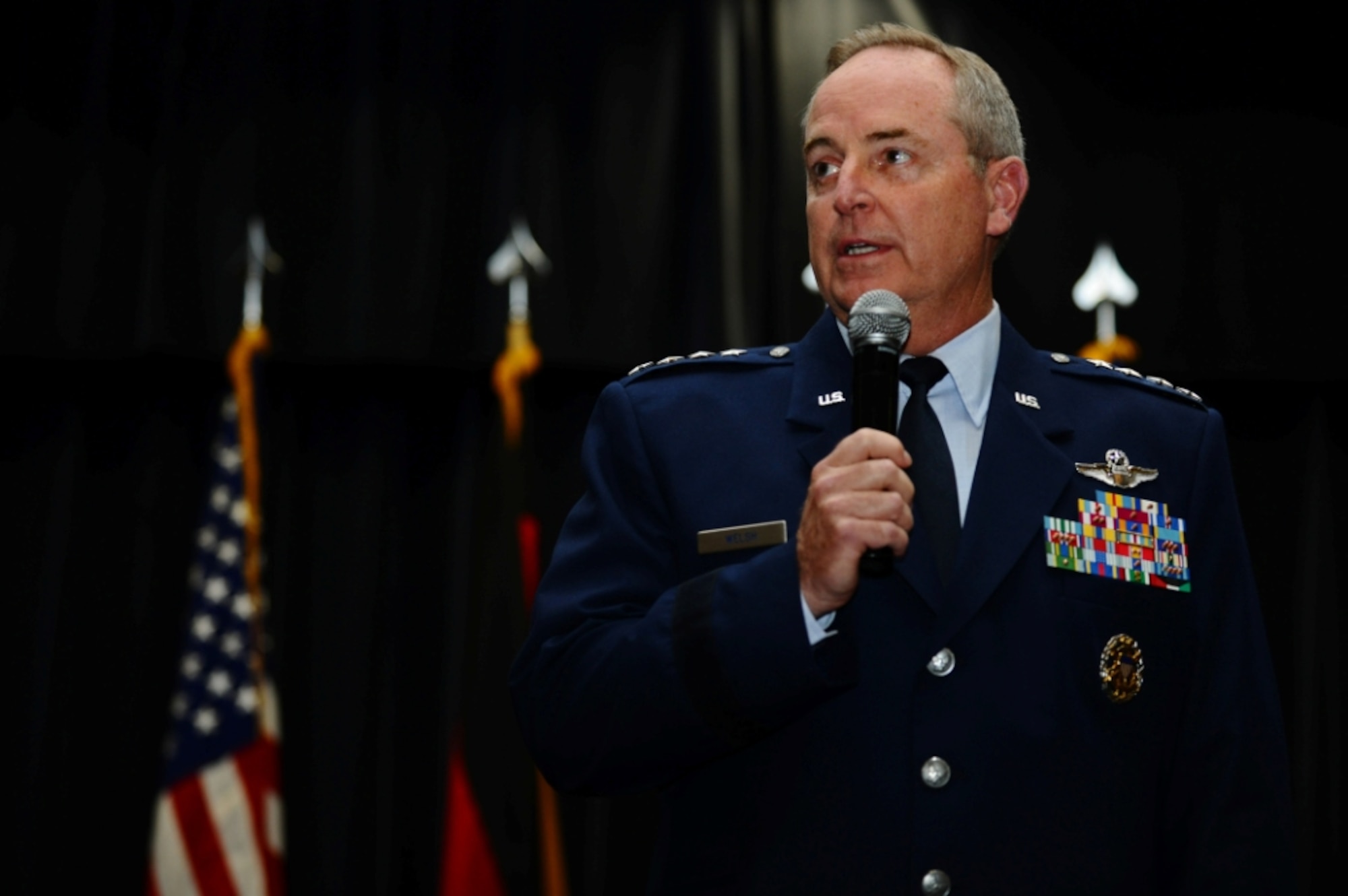 SPANGDAHLEM AIR BASE, Germany – General Mark A. Welsh III, U.S. Air Forces in Europe commander, speaks during a ceremonial pin-on for Col. Chris Weggeman, 52nd Fighter Wing commander, at the Club Eifel ballroom here June 1. Airmen, family and friends attended the ceremony to celebrate Weggeman’s promotion to the rank of brigadier general, which is effective June 5. (U.S. Air Force photo by Airman 1st Class Matthew B. Fredericks/Released)