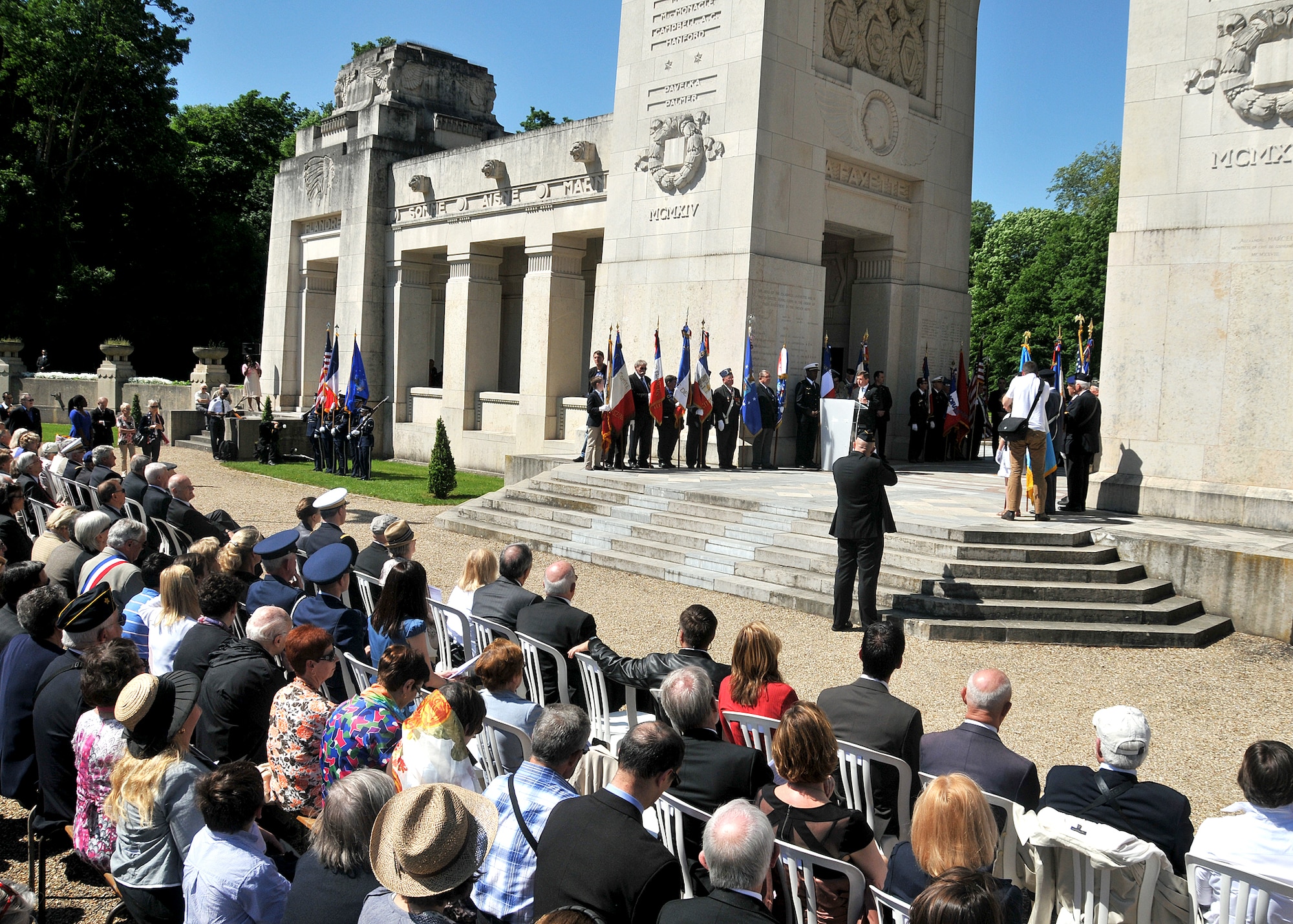 French and U.S. veterans, civilians and servicemembers participate at a Memorial Day ceremony at the Lafayette Escadrille Memorial located on the outskirts of Paris, May 26, 2012. The memorial honors American pilots who volunteered to join the French Escadrille Lafayette and the Lafayette Flying Corps during World War I and also serves as a final resting place for the remains of 49 of those pilots. (U.S. Air Force Photo by Tech. Sgt. Markus M. Maier) (Released)
