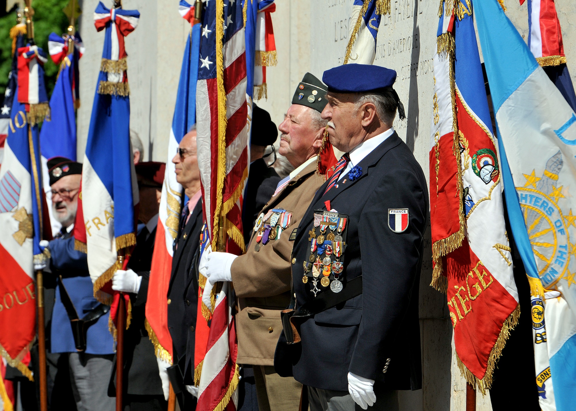 French and U.S. veterans participate during a Memorial Day ceremony at the Lafayette Escadrille Memorial located on the outskirts of Paris, May 26, 2012. The memorial honors American pilots who volunteered to join the French Escadrille Lafayette and the Lafayette Flying Corps during World War I and also serves as a final resting place for the remains of 49 of those pilots. (U.S. Air Force Photo by Tech. Sgt. Markus M. Maier) (Released)