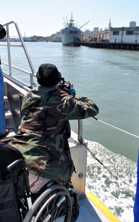 SAN FRANCISCO, Calif. -- A wounded warrior photographs the vessel Jeremiah O'Brien in San Francisco Bay May 29 during a recreation therapy event aboard the U.S. Army Corps of Engineers San Francisco District's vessel, The Dillard.