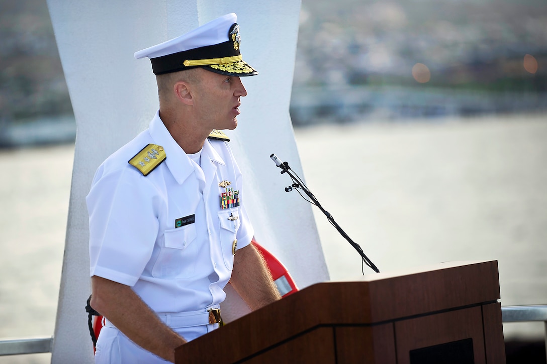 Navy Rear Adm. James F. Caldwell Jr. speaks at the USS Arizona Memorial in Pearl Harbor, Honolulu, June 4, 2012, during a wreath-laying ceremony to commemorate the 70th anniversary of the Battle of Midway.