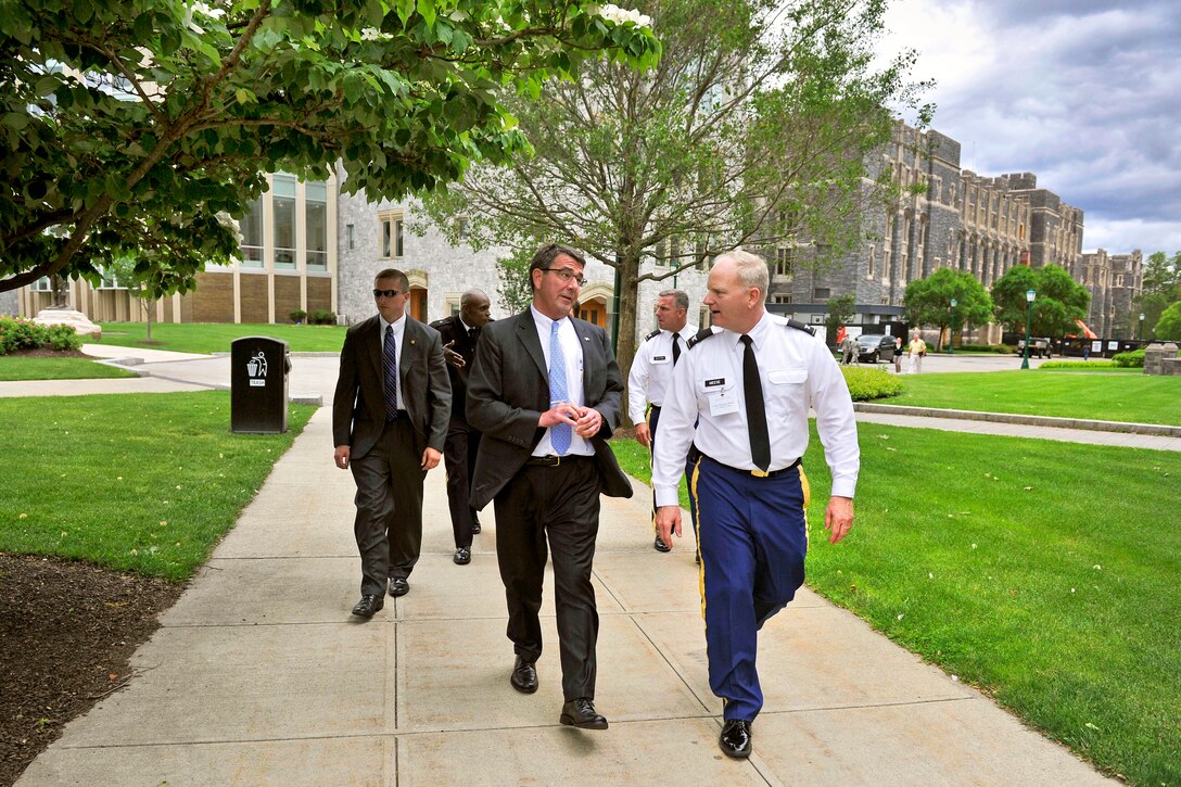 Army Col. Michael J. Meese, head of the social sciences department at the U.S. Military Academy at West Point, N.Y., escorts Deputy Defense Secretary Ashton B. Carter to his helicopter after he delievered remarks to attendees of the Senior Conference XLIX at the academy, June 4, 2012.