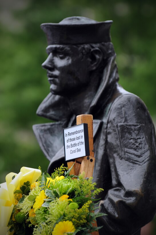 The Australian wreath is laid near the Lone Sailor statue at the U.S. Navy Memorial to commemorate the 70th anniversary of the Battle of the Coral Sea. The battle took place in early May of 1942 and was a major air and naval engagement of World War II in Washington, D.C., May 1, 2012.