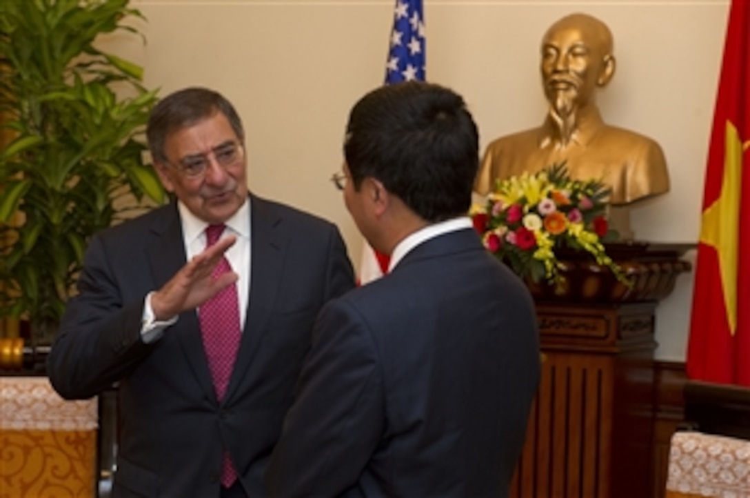 Secretary of Defense Leon E. Panetta speaks with Vietnamese Minister of Foreign Affairs Pham Binh Minh in Hanoi, Vietnam, on June 4, 2012.  Panetta is on ten-day trip to the Asia-Pacific to meet with defense counterparts.  
