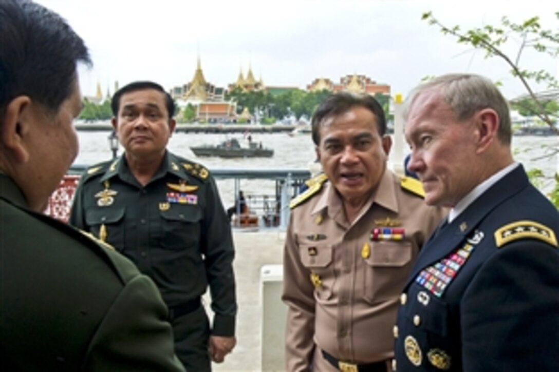 U.S. Army Gen. Martin E. Dempsey, chairman of the Joint Chiefs of Staff, talks with Thailand's joint chiefs during a visit in Bangkok, June 5, 2012.