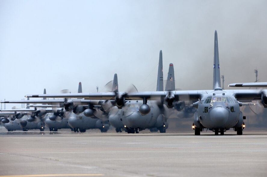 YOKOTA AIR BASE, Japan -- C-130 Hercules from the 36th Airlift Squadron, Alaska Air National Guard, and Tennessee Air National Guard taxi out for a mission during an eight-ship sortie at Yokota Air Base, Japan, on June 5, 2012. The sortie was part of the Samurai Surge exercise. (U.S. Air Force photo by Osakabe Yasuo)