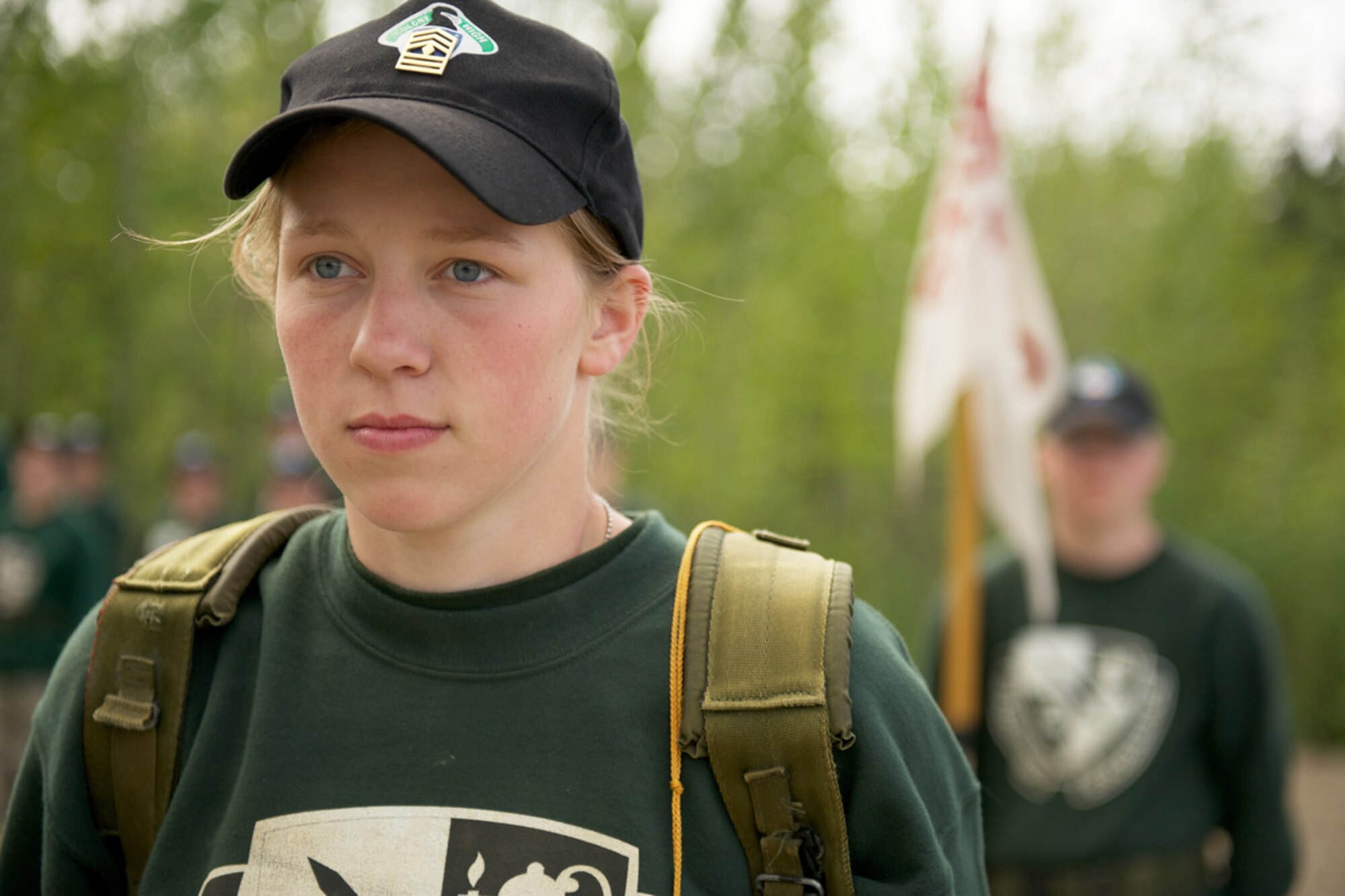 JOINT BASE ELMENDORF-RICHARDSON, Alaska -- Colony High School Junior ROTC Cadet 1st Sgt. Tessa McKittrick, 17, stands at the head of the formation June 1 at the Airborne Sustainment Training Area. (U.S. Air Force photo/David Bedard)