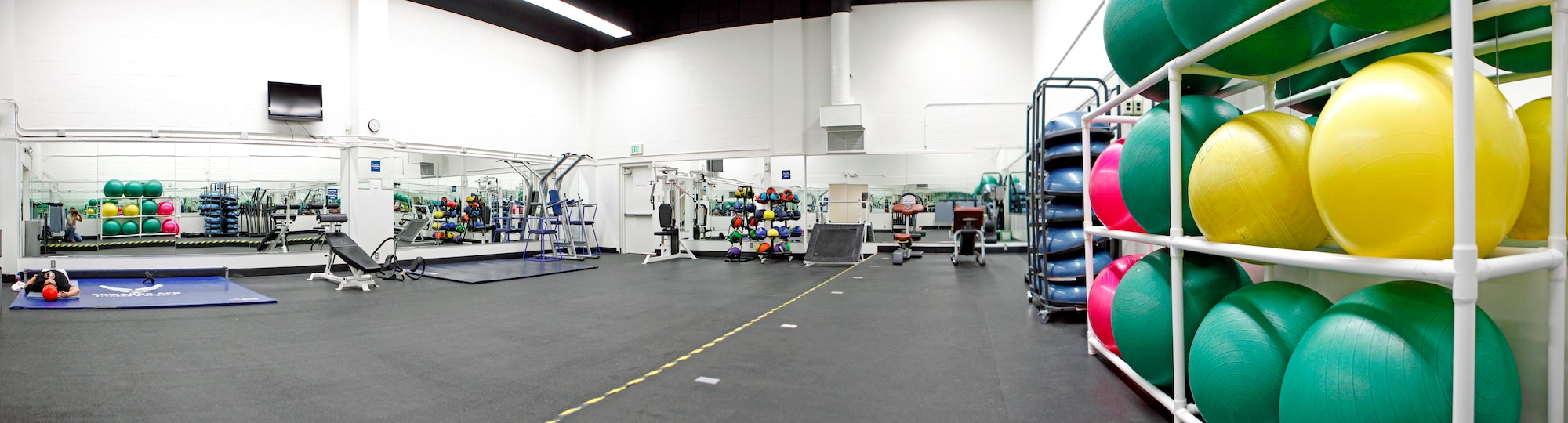 Panoramic view of the Ab room in the Rosburg Fitness Center. The Ab room is just one of the many areas in the main fitness center that were upgraded as part of the final installment in a series of minor upgrades to fitness center facilities at Edwards Air Force Base, Calif.  (U.S. Air Force photo by Jet Fabara)