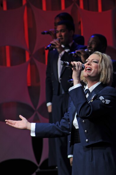 KIRTLAND AFB, N.M. – Senior Airman Joleen Dedmon performs May 30 during a Tops in Blue performance at Popejoy Hall. Tops in Blue’s performance was a mixture of country music and classic and modern rock. (Photo by Ken Moore)
