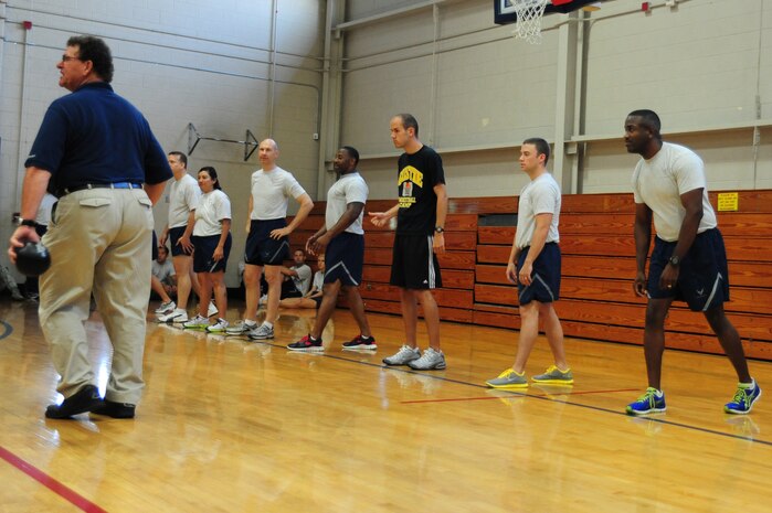 Airmen compete in a dodge ball game, June 1, 2012 at the Joint Base Charleston - Air Base Fitness Center. In the past 10 years, it is estimated more than 66,000 Airmen have participated in the Fitness/Sports Challenge. (U.S. Air Force photo/ Airman 1st Class Chacarra Walker)