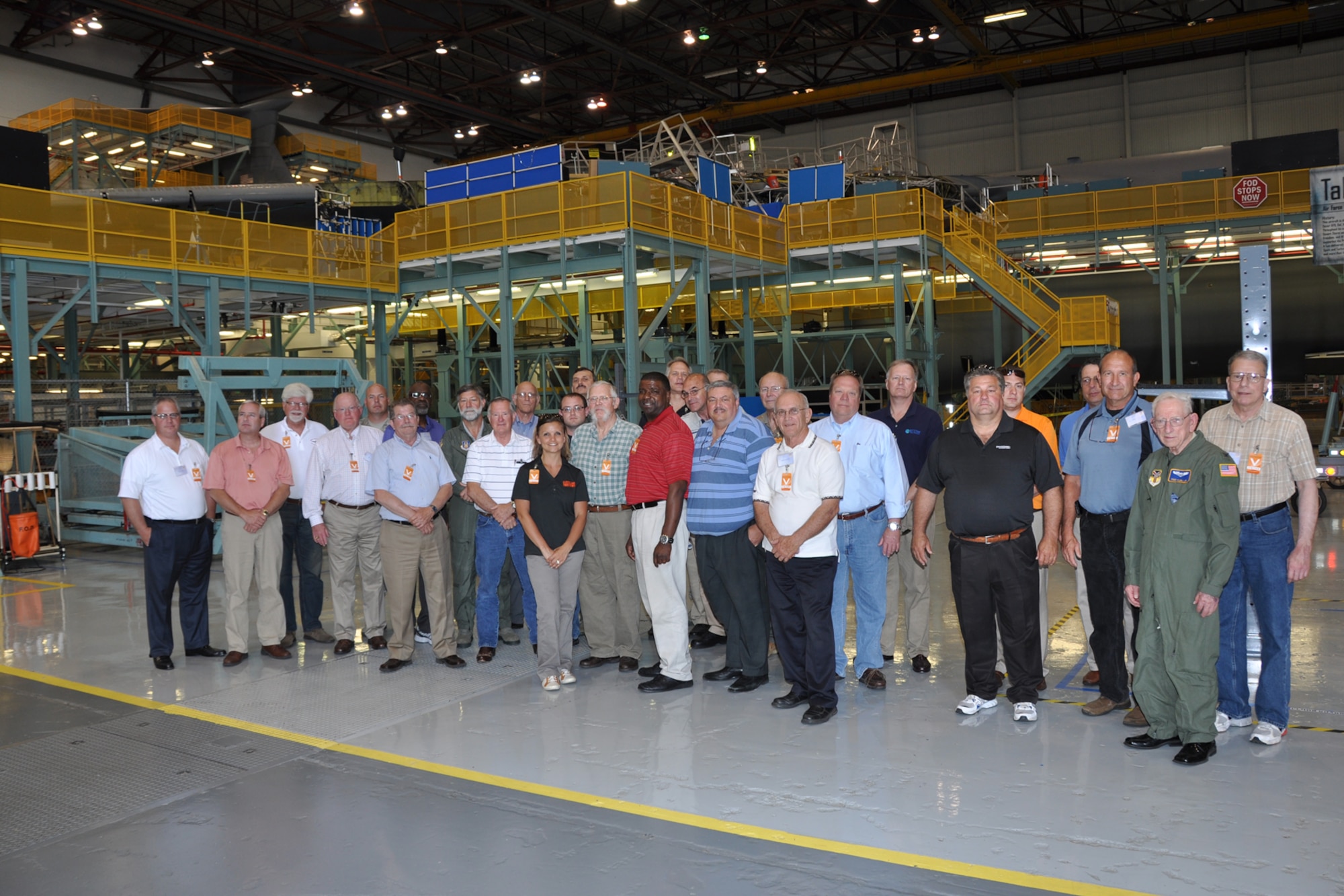 YOUNGSTOWN AIR RESERVE STATION, Ohio – Attendees of the civic leader tour stop for a photo in front of a C-5 during a tour of Lockheed Martin at Dobbins Air Force Base, Ga., June 23, 2012. The civic leader tour program is part of the 910th Airlift Wing’s community relations initiative and is made possible by funding from the Base Community Council.  (U.S. Air Force photo by Staff Sgt. Megan Tomkins)