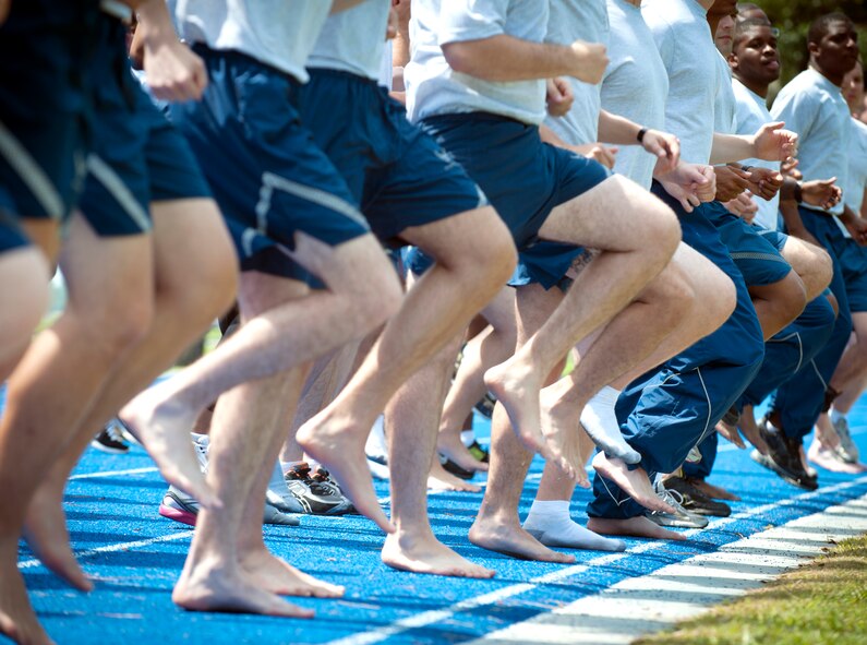 Moody Airmen run in place during a running clinic at Moody Air Force Base, Ga., May 30, 2012. Airmen focused on using the body’s natural spring to maintain an efficient running gait. (U.S. Air Force photo by Airman 1st Class Jarrod Grammel/Released)
