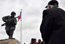 World War II veteran Al Mambre views the recently unveiled memorial to Army Maj. Richard “Dick” Winters June 6, 2012, near Utah Beach, France. Mambre, a member of the famed “Easy” Company, 2nd Battalion, 506th Parachute Infantry Regiment of the 101st Airborne Division, was joined by other World War II veterans and more than 200 attendees to unveil a statue dedicated to Winters. The memorial eulogizes Winter’s unwavering commitment to the soldiers he was assigned and the leadership young officers and noncommissioned officers showcased during battle in Europe. Winters and his company were made famous by the New York Times bestseller and same-titled television series “Band of Brothers” that documents the Airborne paratroopers’ time fighting in France, Holland and Germany. (U.S. Air Force photo/Staff Sgt. Stephen J. Collier)
