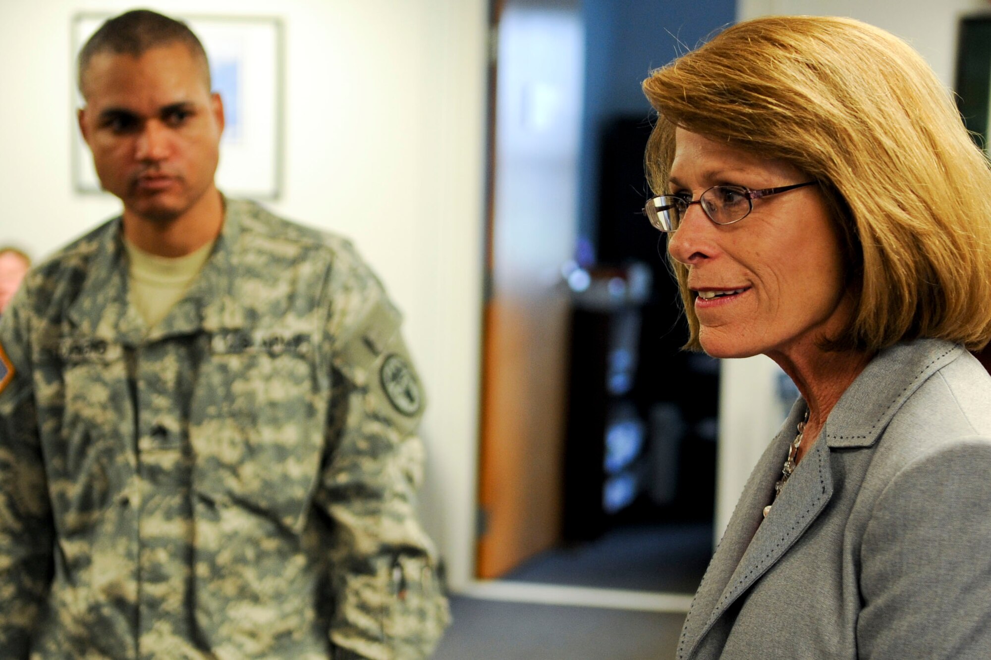 Jeanne Chandler, wife of Sgt. Maj. of the Army Raymond F. Chandler III, speaks with Soldiers from the Warrior Transition Unit at the Soldier and Family Assistance Center at Ft. Eustis, Va., June 5, 2012. Along with receiving a tour of the facility, Chandler also visited the local school where she read to two classes of third-grade students. (U.S. Air Force photo by Senior Airman Wesley Farnsworth/Released)