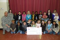 MINOT AIR FORCE BASE, N.D. -- Mrs. Thorlakson's 4th grade class here was awarded for "Most Money" raised towards the fight against cancer during the North Plains Elementary School's third Annual Penny War Competition. (Courtesy photo)

