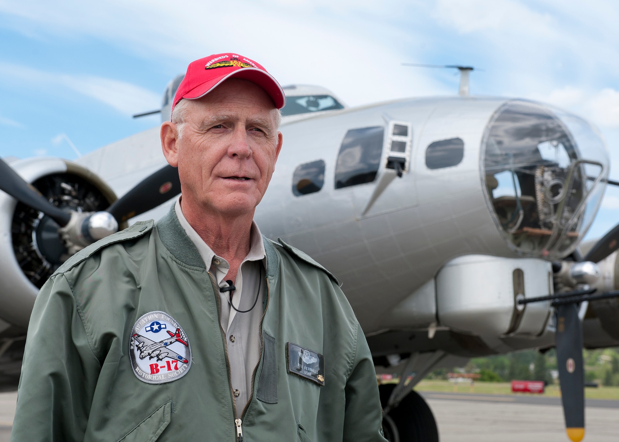 Rick Fernalld, Experimental Aircraft Association B-17 pilot, poses for a photo in front of the Aluminum Overcast at Felts Field in Spokane Valley, Wash., May 29, 2012. Members of Team Fairchild had the unique opportunity to tour the B-17 from June 1 to 3, 2012. (U.S. Air Force photo by Staff Sgt. Michael Means/Released)  