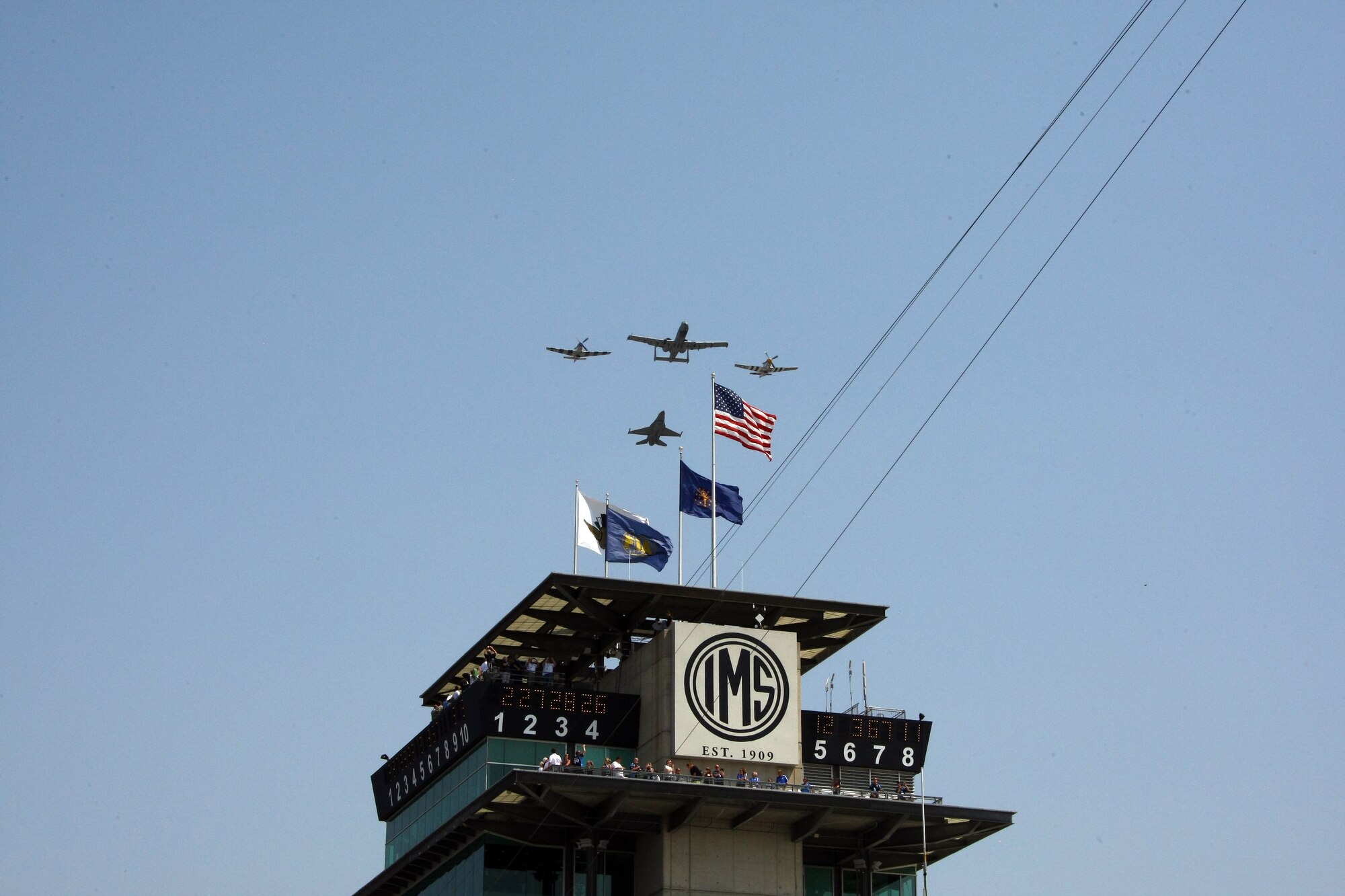 U.S. Air Force Maj. Andrew Congdon, 20th Fighter Wing F-16 Fighting Falcon pilot, took part in a heritage flyover during the opening ceremony of the Indianapolis 500 at the Indianapolis Motor Speedway May 27, 2012 .Congdon joined an A-10 from Davis-Monthan AFB, Ariz. and two P-51 aircraft from the Air Force Heritage Flight Foundation to perform the four-ship demonstration. (Courtesy photo)

