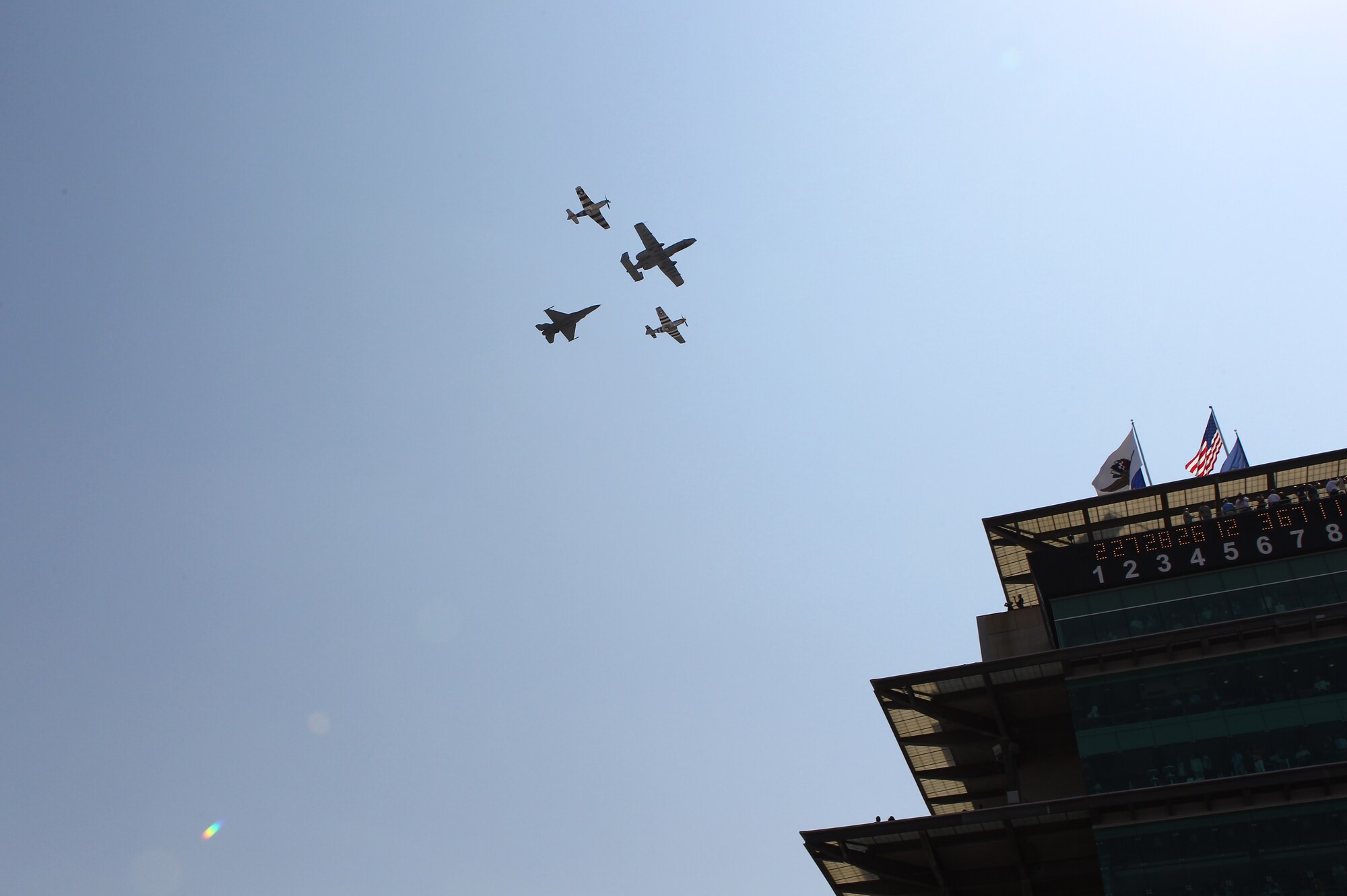 U.S. Air Force Maj. Andrew Congdon, 20th Fighter Wing F-16 Fighting Falcon pilot, took part in a flyover during the opening ceremony of the Indianapolis 500 at the Indianapolis Motor Speedway May 27, 2012 .Congdon joined an A-10 from Davis-Monthan AFB, Ariz. and two P-51 aircraft from the Air Force Heritage Flight Foundation to perform the four-ship demonstration. (Courtesy photo)

