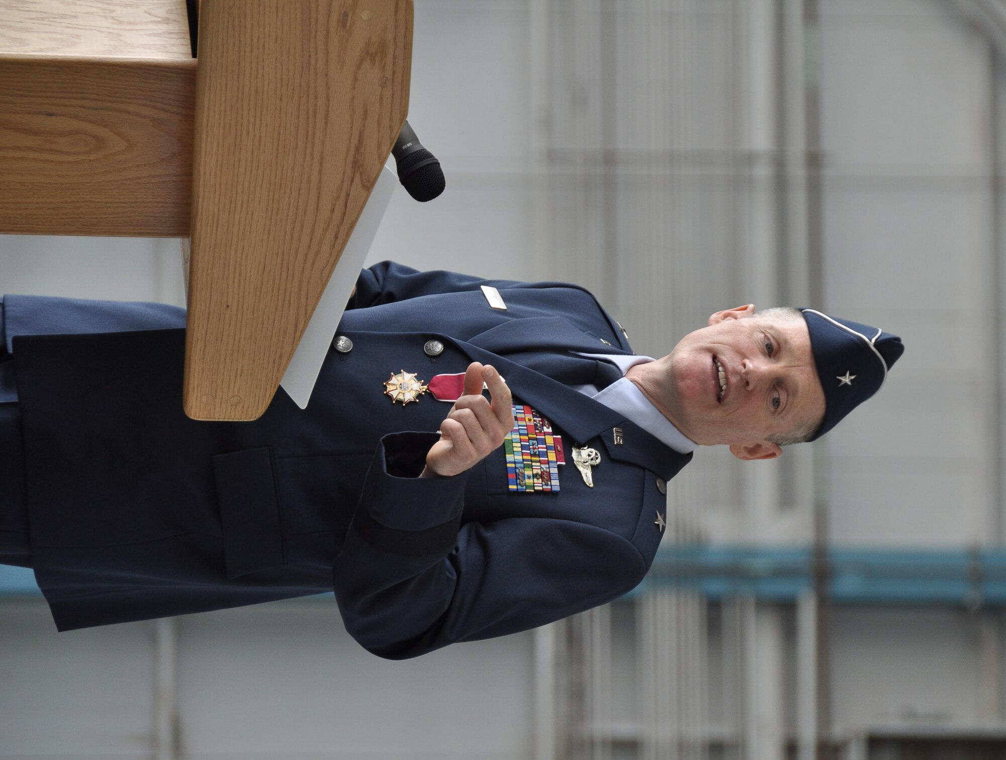 Brig. Gen. Kenneth D. Lewis, outgoing commander addresses the audience during the 433rd Airlift Wing Change of Command ceremony on Joint Base San Antonio – Lackland AFB, Texas, June 3, 2012. Col. Pennington assumed command from Brig. Gen. Lewis. (U.S. Air Force photo/Senior Airmen Brian McGloin)

