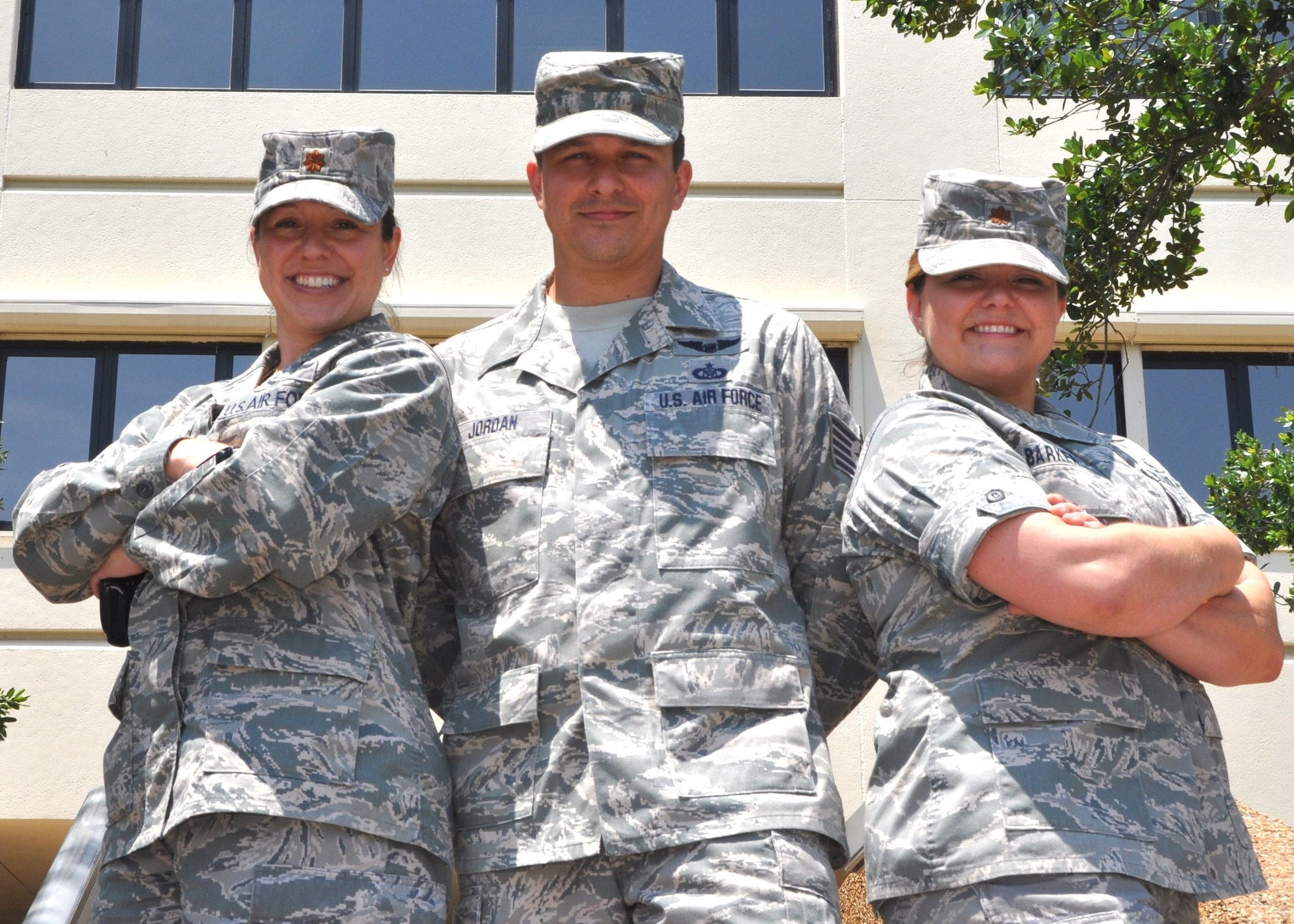 Three Air Force siblings recently found themselves at the same duty location for the first time in their 13-year careers at Keesler Air Force Base, Miss. Maj. Amalia DiVittorioare was on temporary duty here from the Pentagon to implement the 81st Medical Group's MiCare program; Sgt. John Alex Jordan was attending Keesler’s Mathies NCO Academy from Offutt Air Force Base, Neb., and Maj. Amber Barker is commander of the 81st Medical Group’s education and training flight. (U.S. Air Force photo by Steve Pivnick)