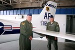 The 12th FTW tail flash is unveiled on a T-53A trainer during a redesignation ceremony at the U.S. Air Force Academy's airfield in Colorado Springs, Colo. June 6, 2012.   Led by 12th Flying Training Wing commander Col. RIchard Murphy and Col. Richard Plamp, commander 306th Flying Training Group, the 12th FTW took formal control of the group June 1 by order of Gen. Edward Rice, commander of Air Education and Training Command, due to the scheduled inactivation of the 19th Air Force.    (U.S. Air Force photo/Mike Kaplan) 