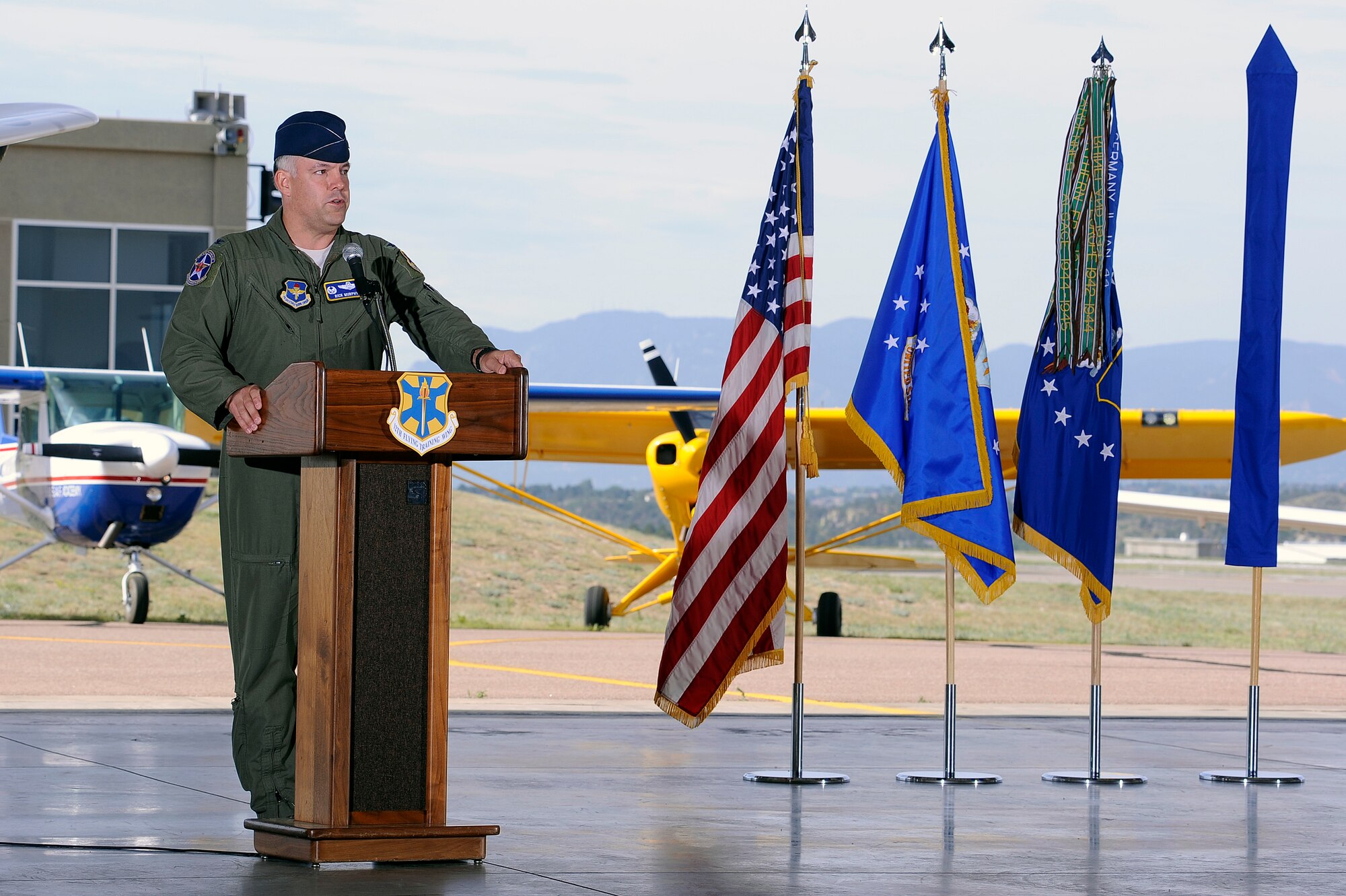 Col. Richard Murphy, commander 12th Flying Training Wing opens the 12th Redesignation Ceremony at the U.S. Air Force Academy's airfield in Colorado Springs, Colo. June 6, 2012.   The 12th FTW took formal control of the group June 1 by order of Gen. Edward Rice, commander of Air Education and Training Command, due to the scheduled inactivation of the 19th Air Force.    (U.S. Air Force photo/Mike Kaplan) 