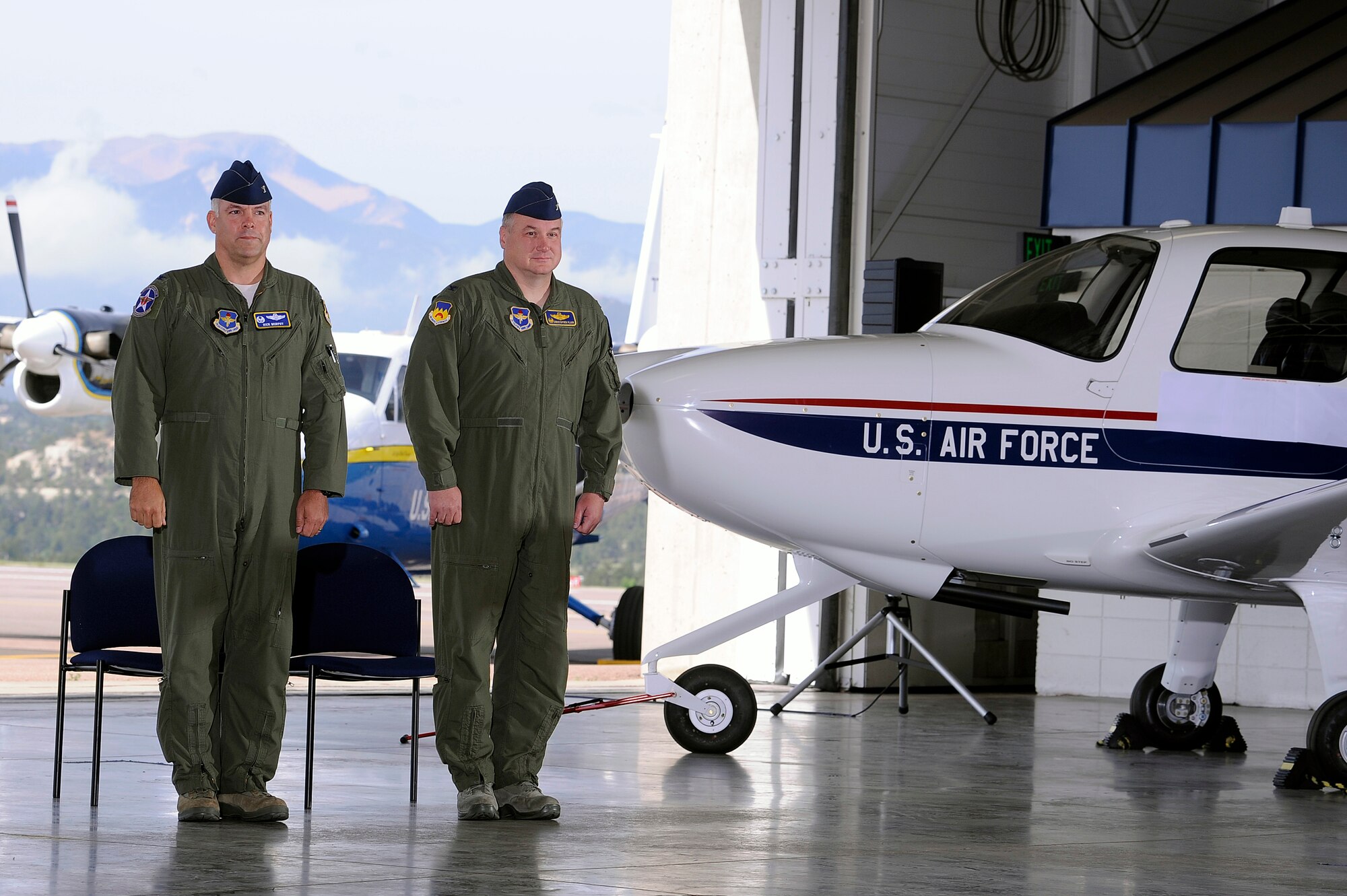 Col. Richard Murphy, commander 12th Flying Training Wing and Col. Richard Plamp, commander 306th Flying Training Group, U.S. Air Force Academy, Colo. opens the 12th Redesignation Ceremony at the Academy's airfield in Colorado Springs, Colo. June 6, 2012.   The 12th FTW took formal control of the group June 1 by order of Gen. Edward Rice, commander of Air Education and Training Command, due to the scheduled inactivation of the 19th Air Force.    (U.S. Air Force photo/Mike Kaplan) 